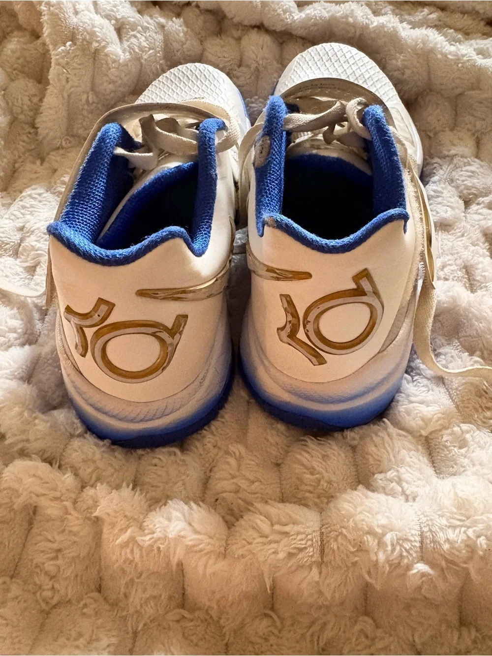 Nike White Sneakers with Blue and Gold Accents
